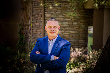 Portrait of Travis Winfield smiling